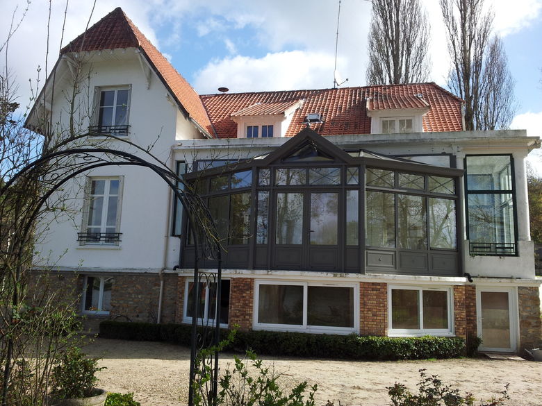 Een orangerie uitbreiding in landelijke stijl